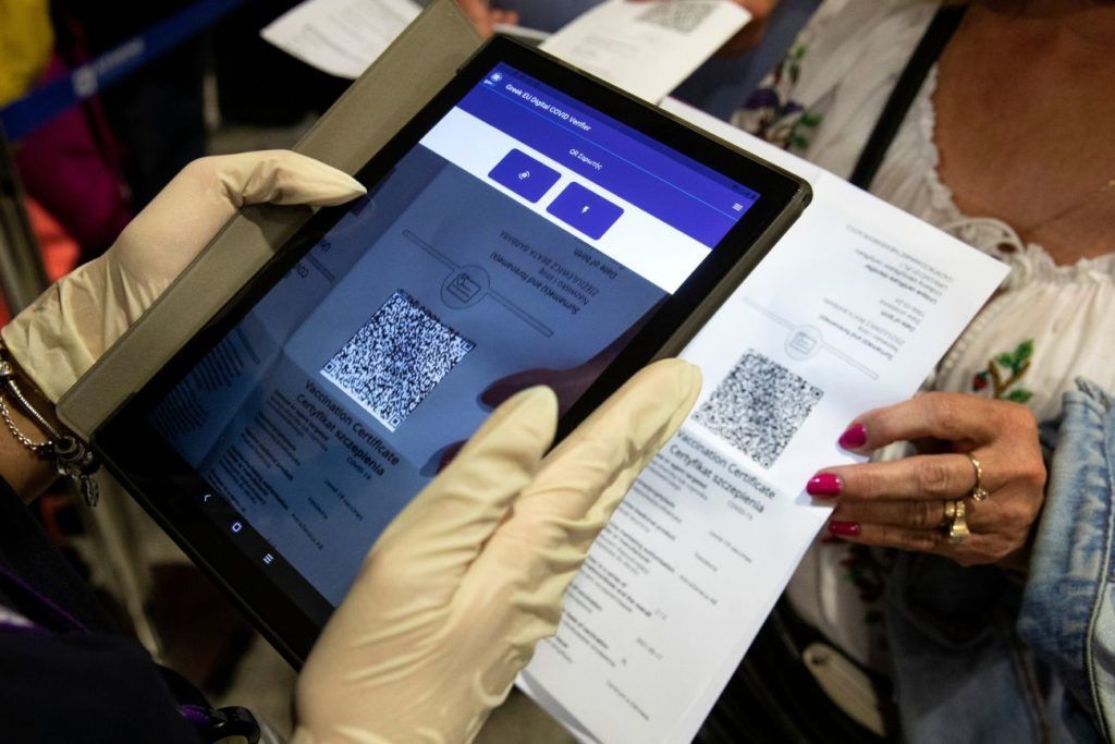 A Greek police officer scanning the EU Digital COVID Certificate of a passenger, upon her arrival at Athens International Airport. Source: EC - Audiovisual Service / Photographer: Yorgos Karahalis